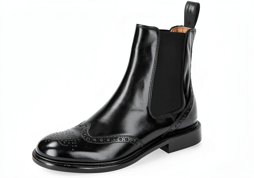 Bottes Melvin Hamilton en cuir noir portées avec un jean